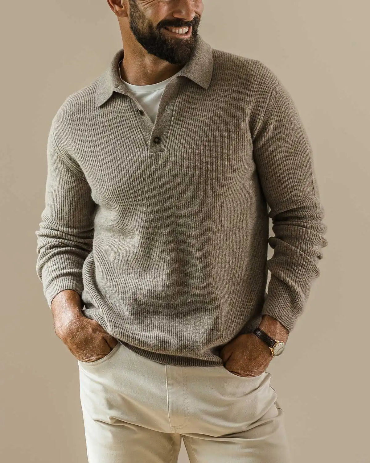 Model wearing a polo neck fine merino sweater with a white undershirt