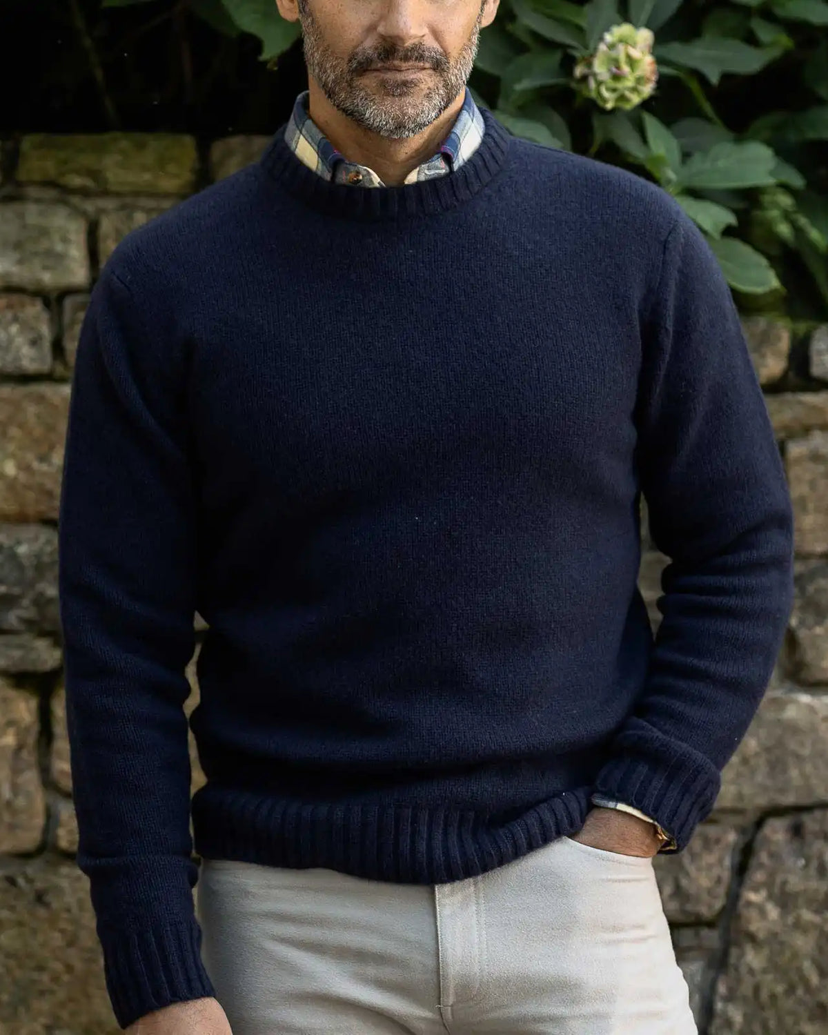 Men's Navy Boden Crew sweater styled with chinos — lifestyle shot