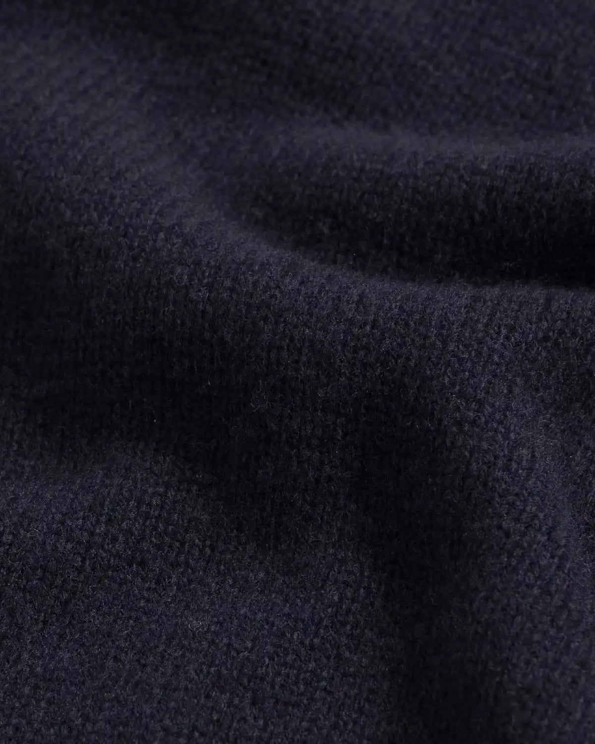 Close-up of 100% merino wool 5gg jersey knit on the Navy Boden Crew sweater
