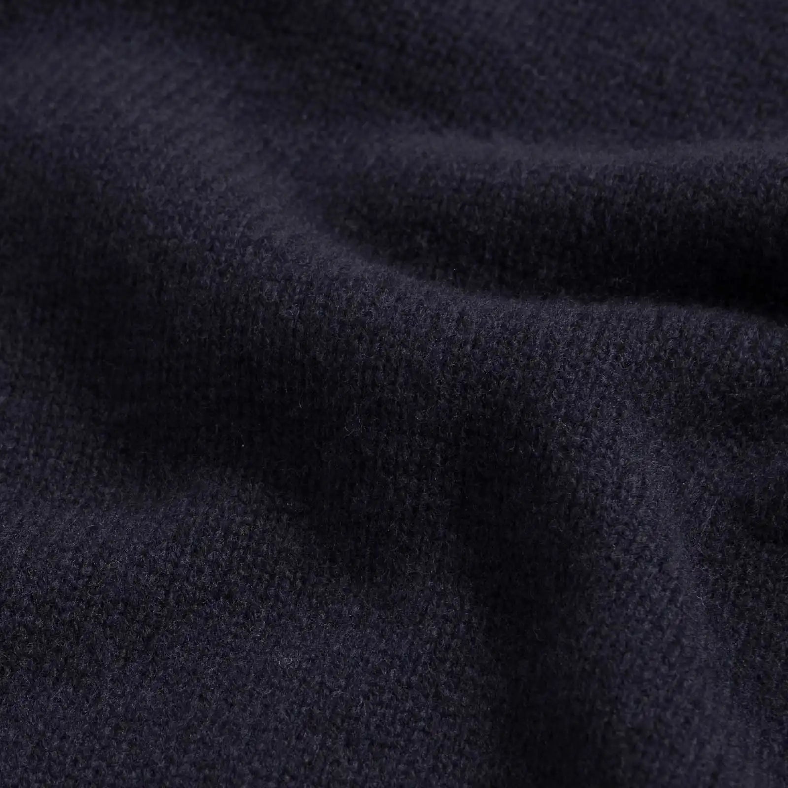 Close-up of 100% merino wool 5gg jersey knit on the Navy Boden Crew sweater