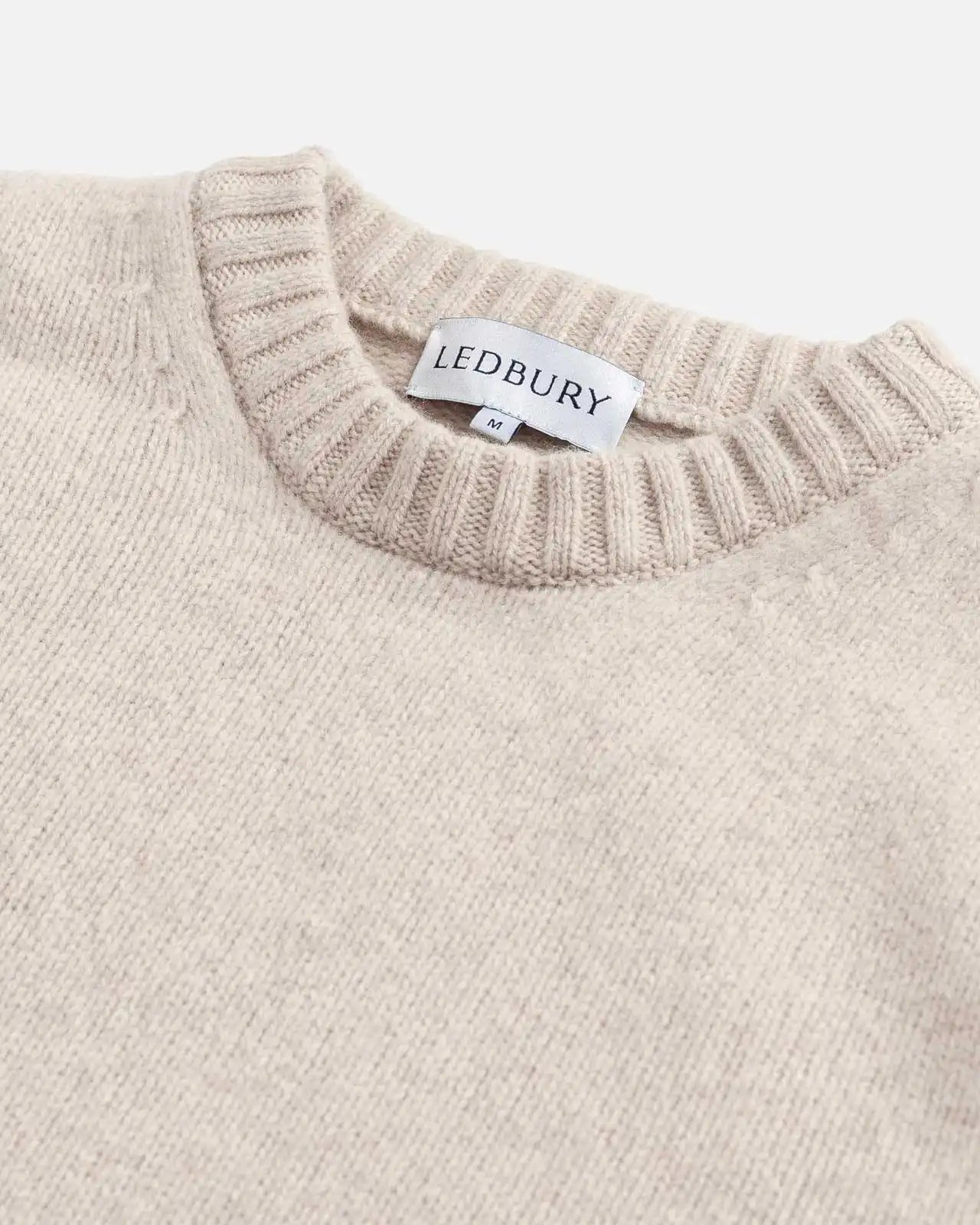 Contrast ribbing detail at neck and cuffs on the Beige Boden Crew sweater by Ledbury
