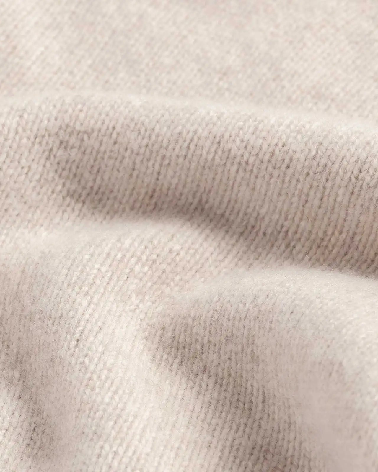 Close-up of 100% merino wool 5gg jersey knit on the Beige Boden Crew sweater