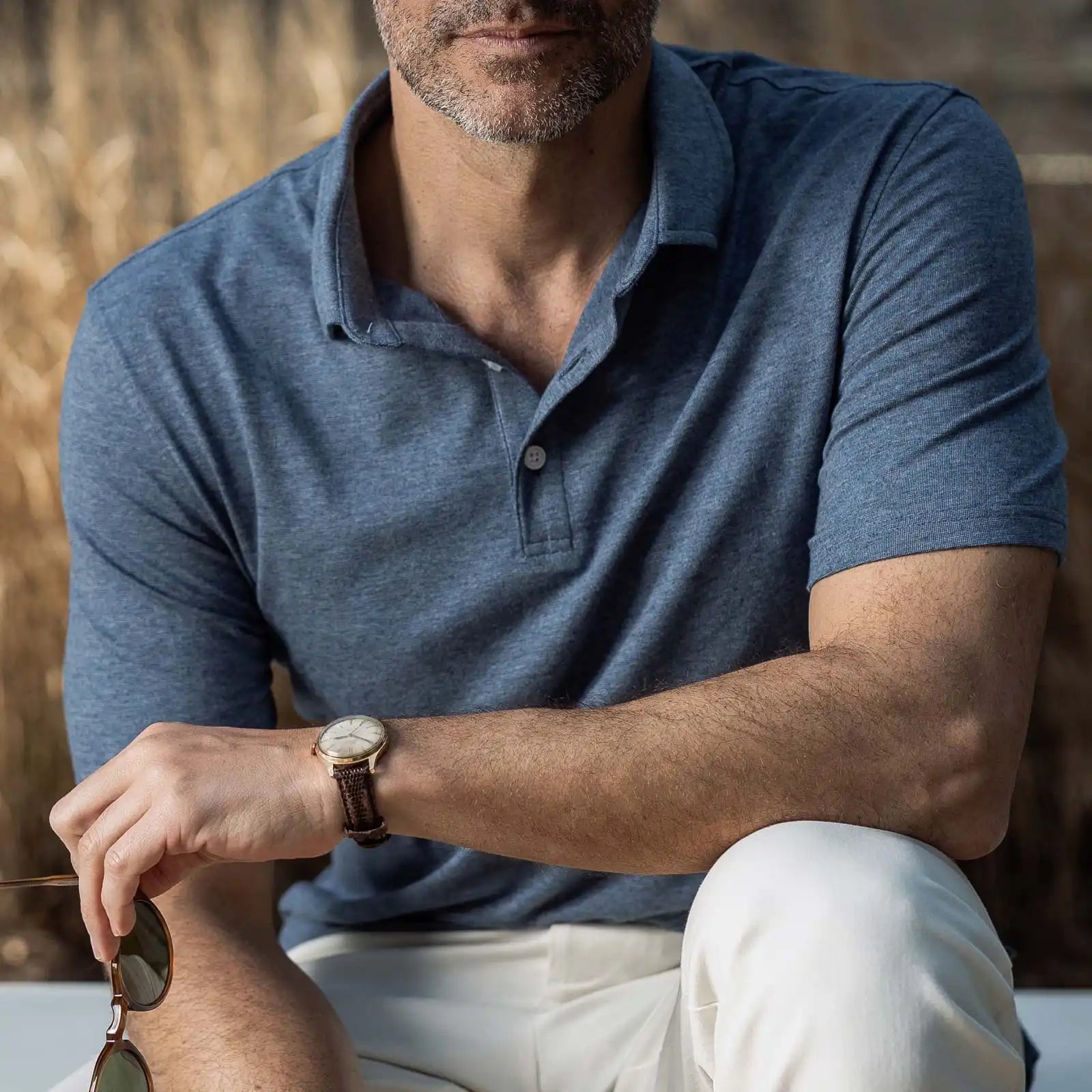 Lifestyle shot of the Ledbury Freeman Knit Custom Polo in Bay Blue