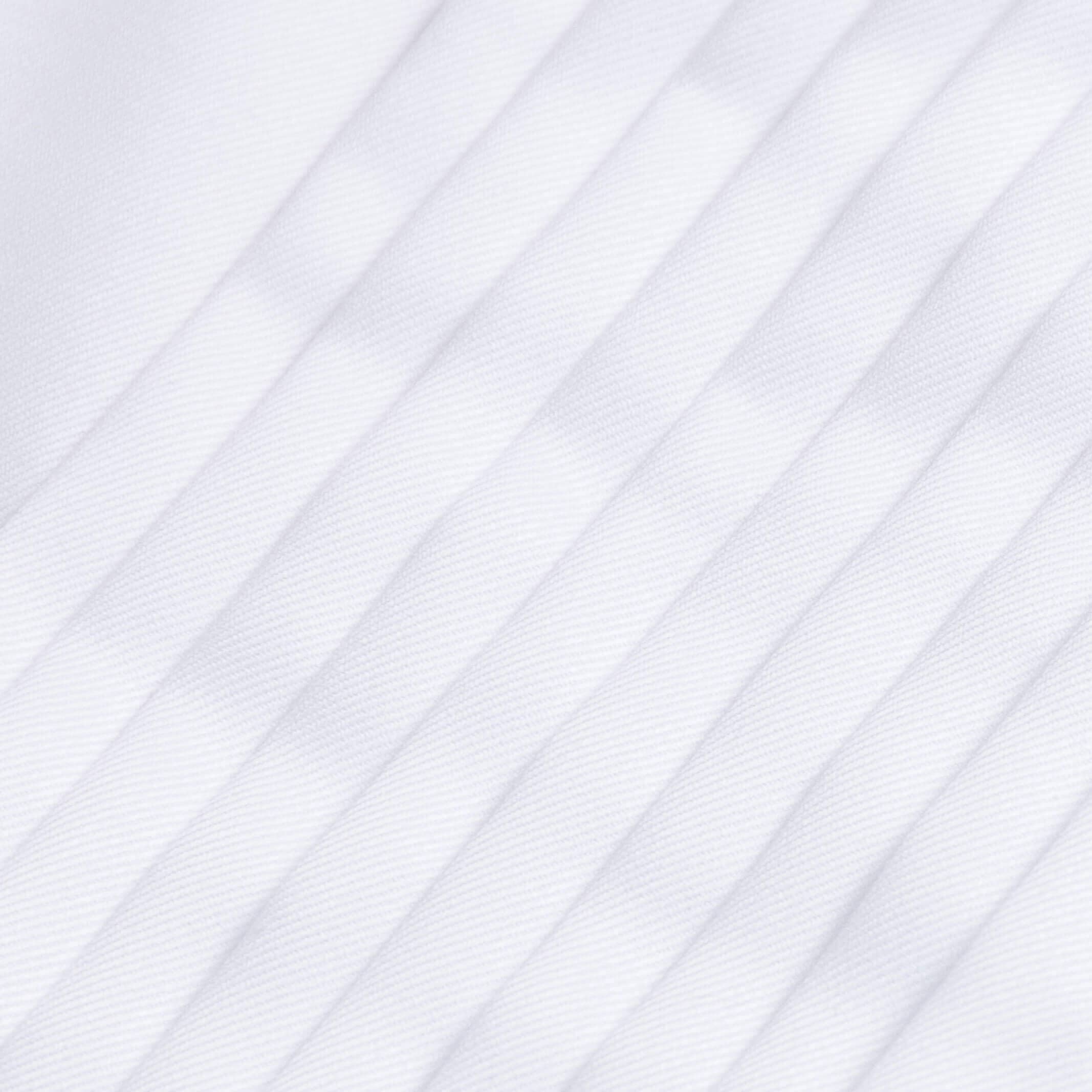 Pleated front tuxedo shirt detail - elegant pleats on non-iron dress shirt