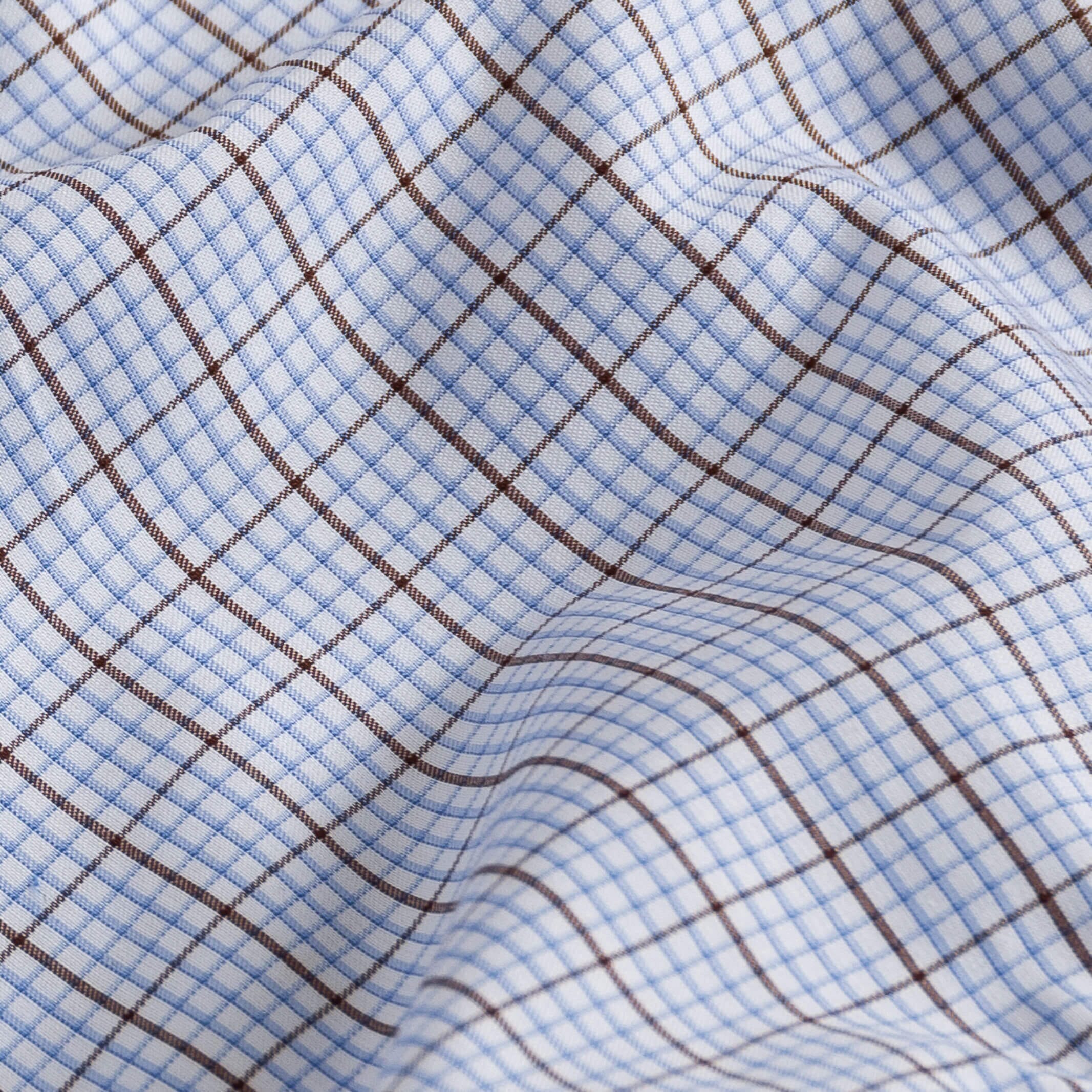 Kent micro-twill fabric close-up - brown windowpane check pattern texture