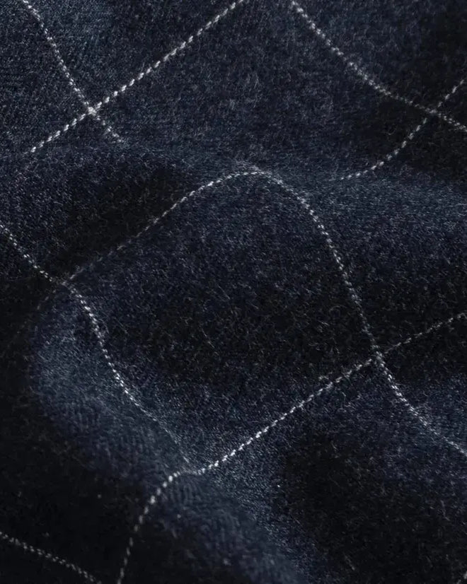 Brushed twill fabric close-up - navy windowpane check pattern texture