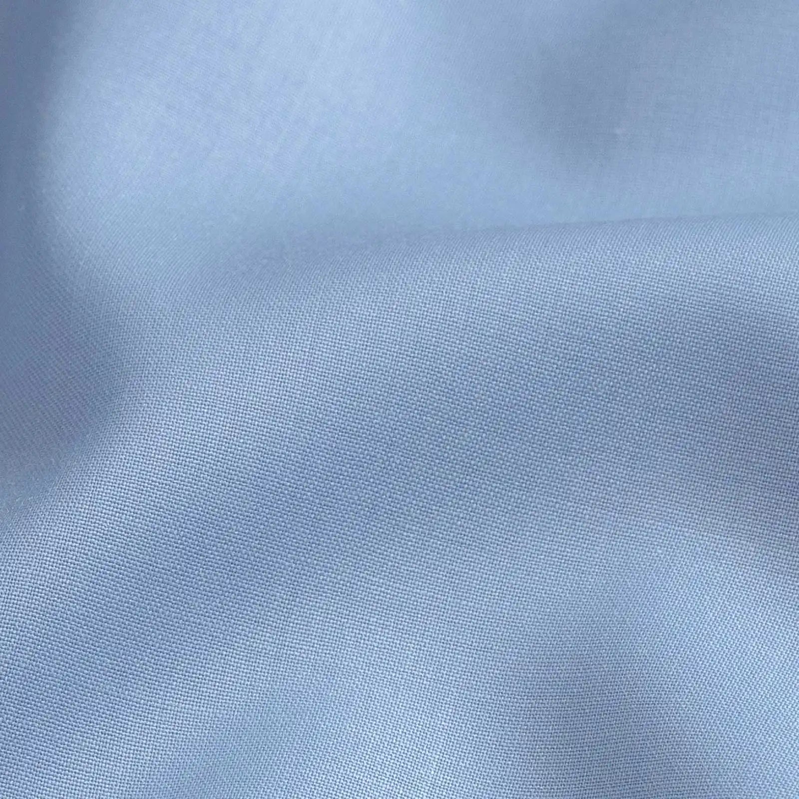 Light blue Merino wool fabric close-up - Ledbury Reda stretch with matte horn buttons