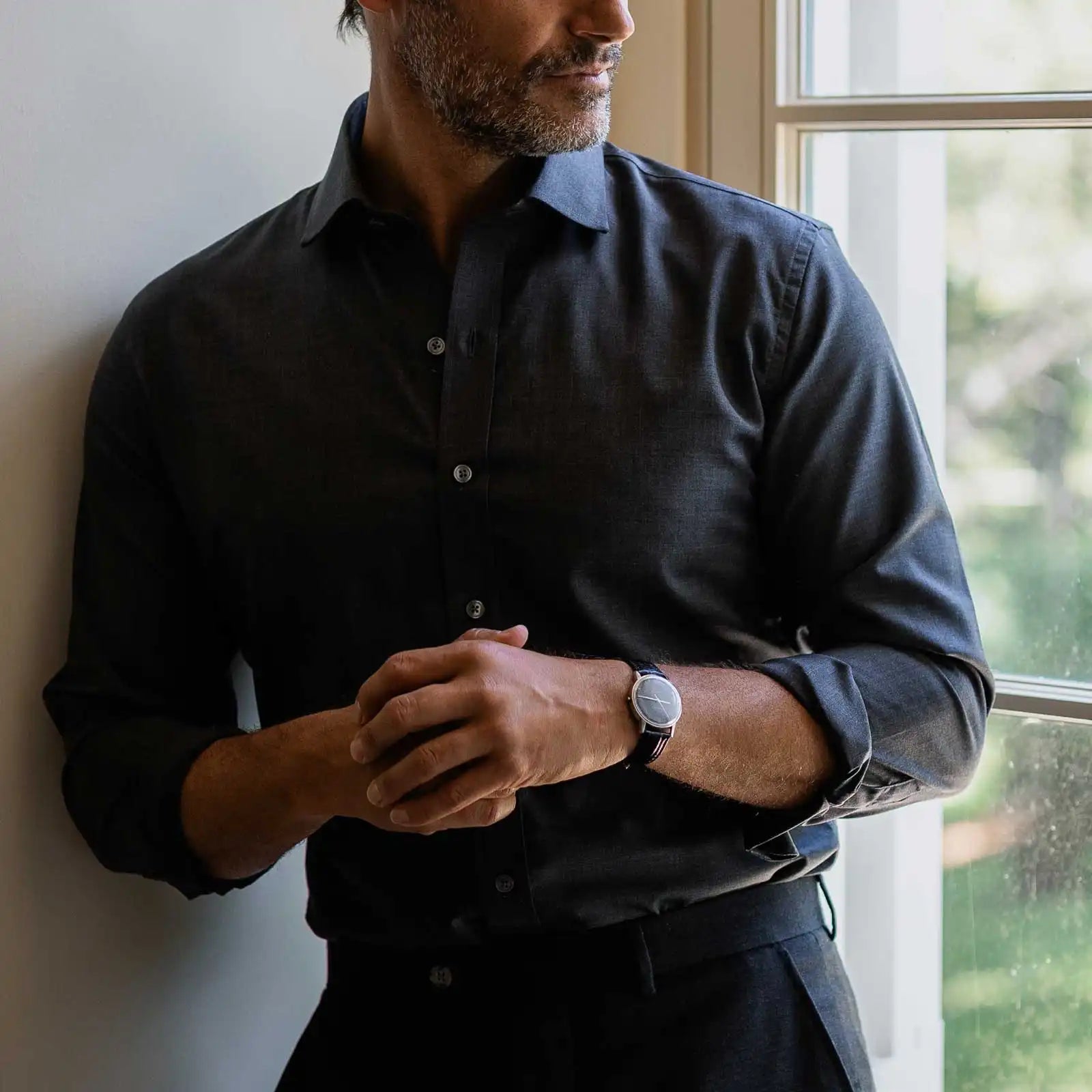 Charcoal Reda Merino shirt on a model- 100% New Zealand wool with natural stretch