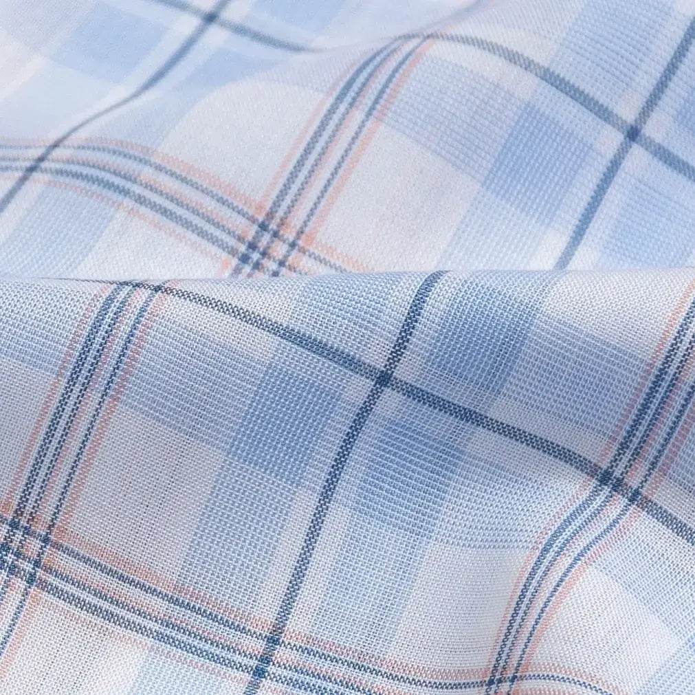Sky blue plaid Tencel fabric close-up - 100% Tencel Alta poplin weave texture