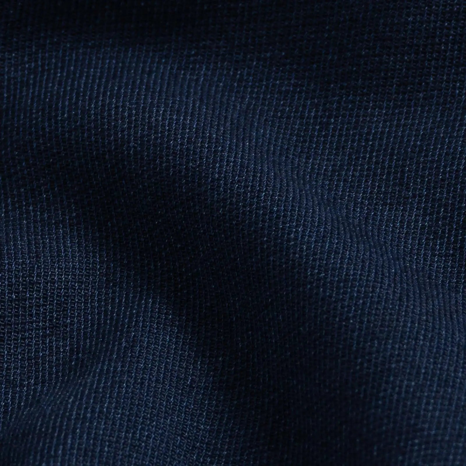 Indigo Lisden denim shirt fabric close-up - natural indigo dobby weave
