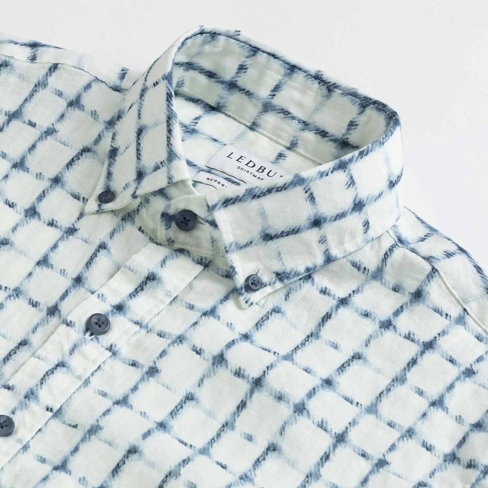 Collar detail of Italian linen white and navy check shirt