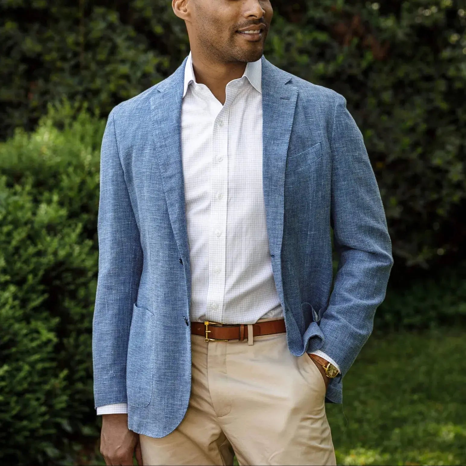 Model wearing the brick red Singer herringbone weave dress shirt