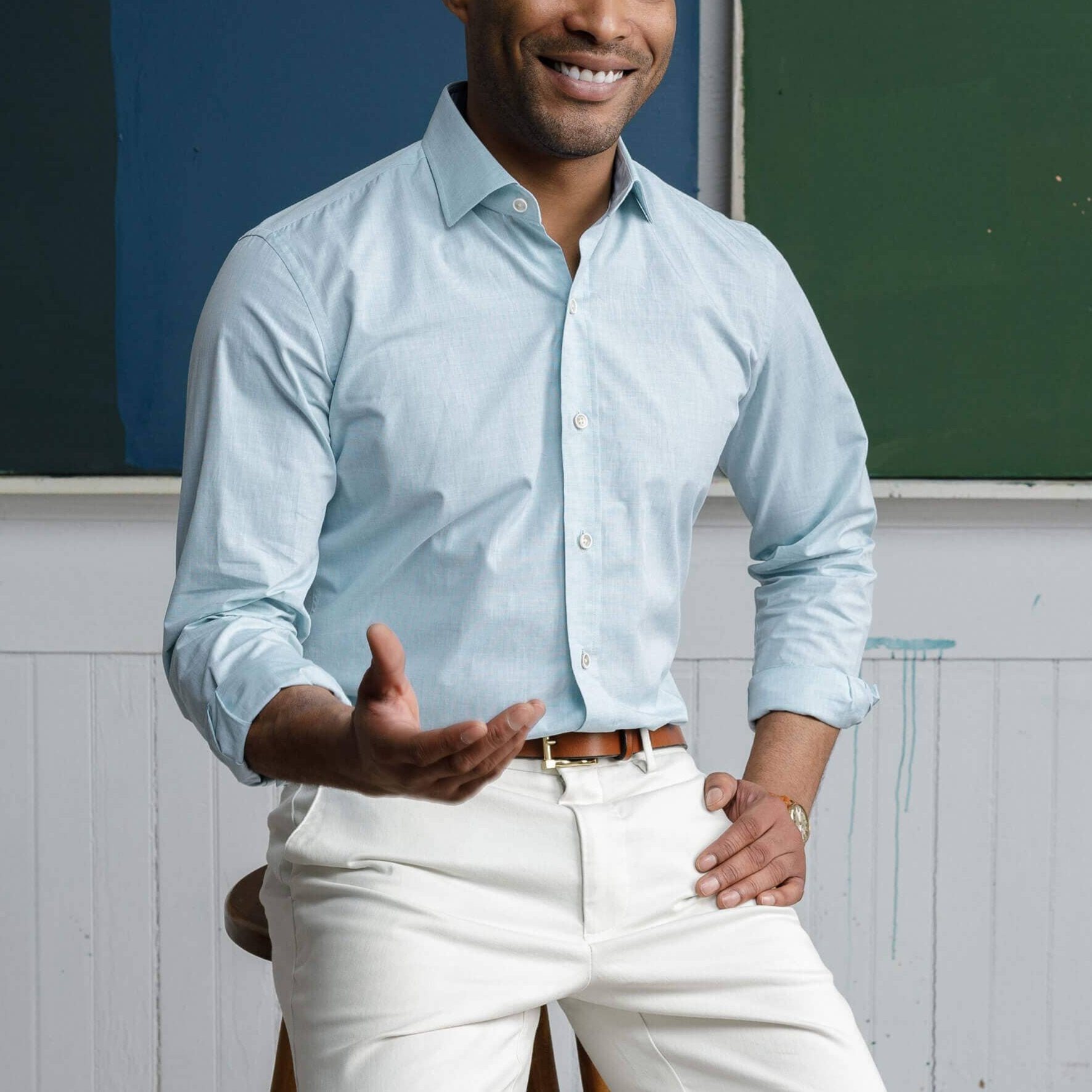 Man wearing green Hucks chambray shirt lifestyle - Ledbury custom fit dress shirt