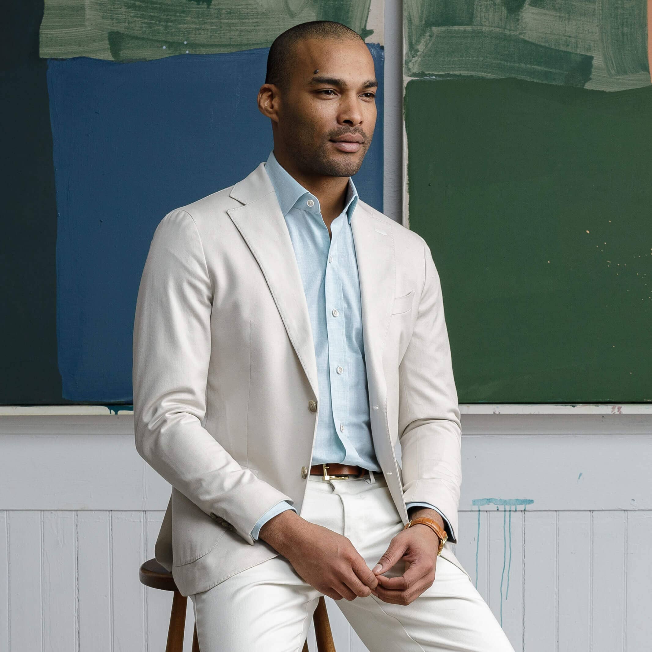 Green chambray shirt styled with a tan suit - Ledbury Hucks custom shirt