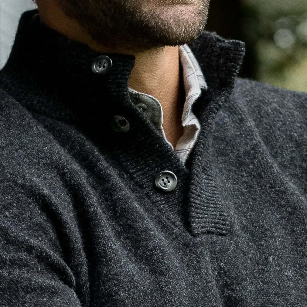 Three-button ribbed mock collar detail on the Dark Grey Brewer Mock Neck Sweater