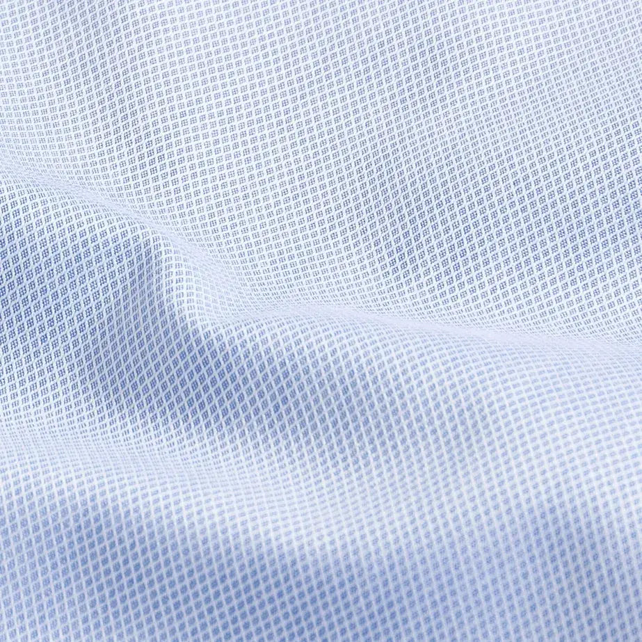 Blue dobby fabric close-up - Italian-woven diamond texture