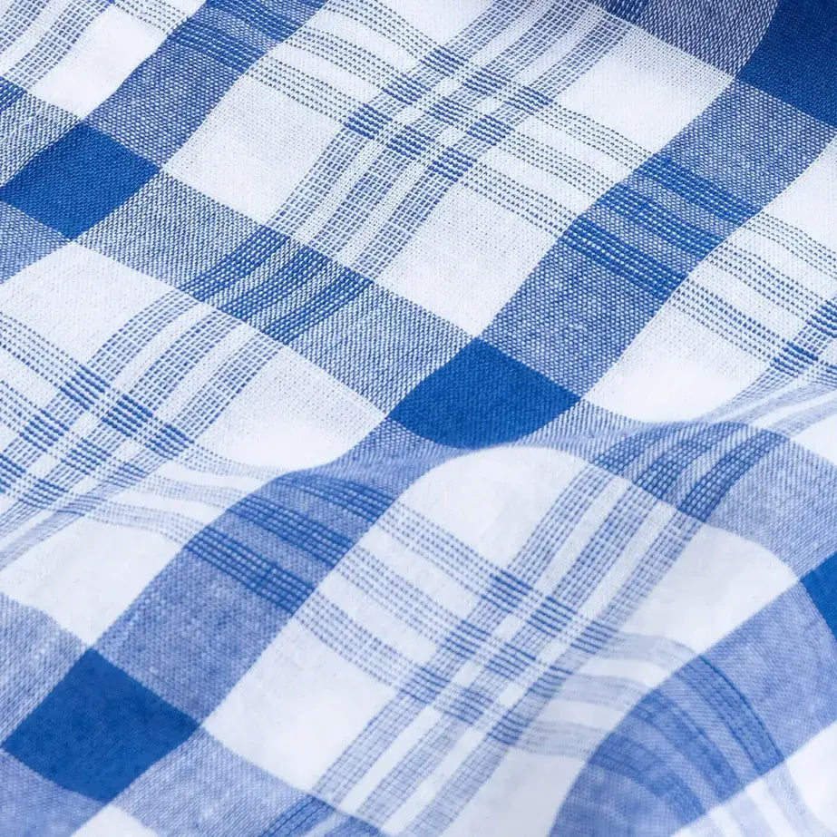 Blue plaid cotton linen fabric close-up - 70% cotton 30% linen Joyner texture