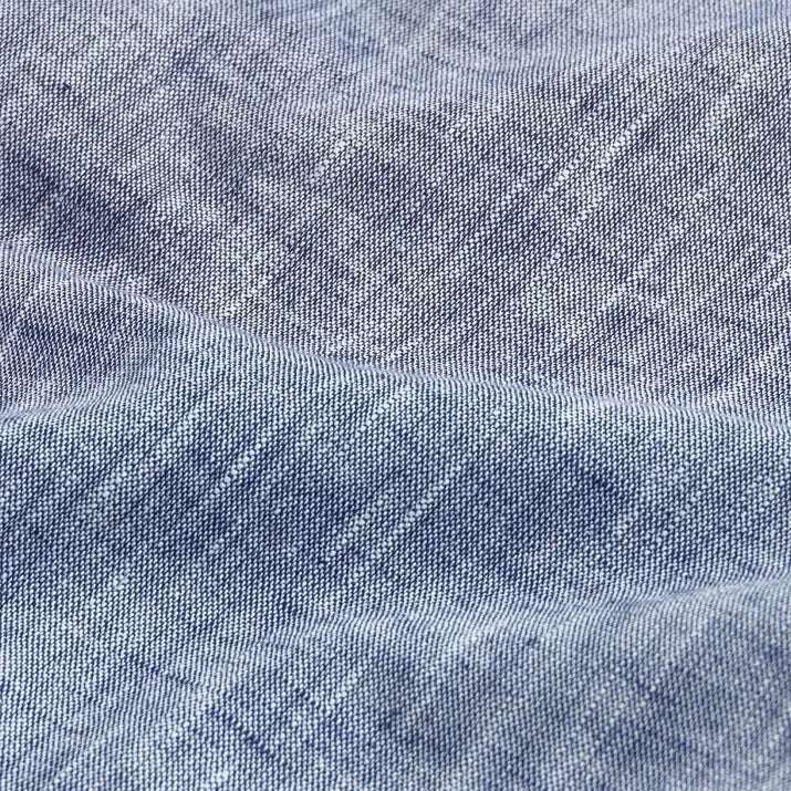 Navy blue Sandoval oxford chambray fabric texture closeup - Ledbury slub cotton weave detail