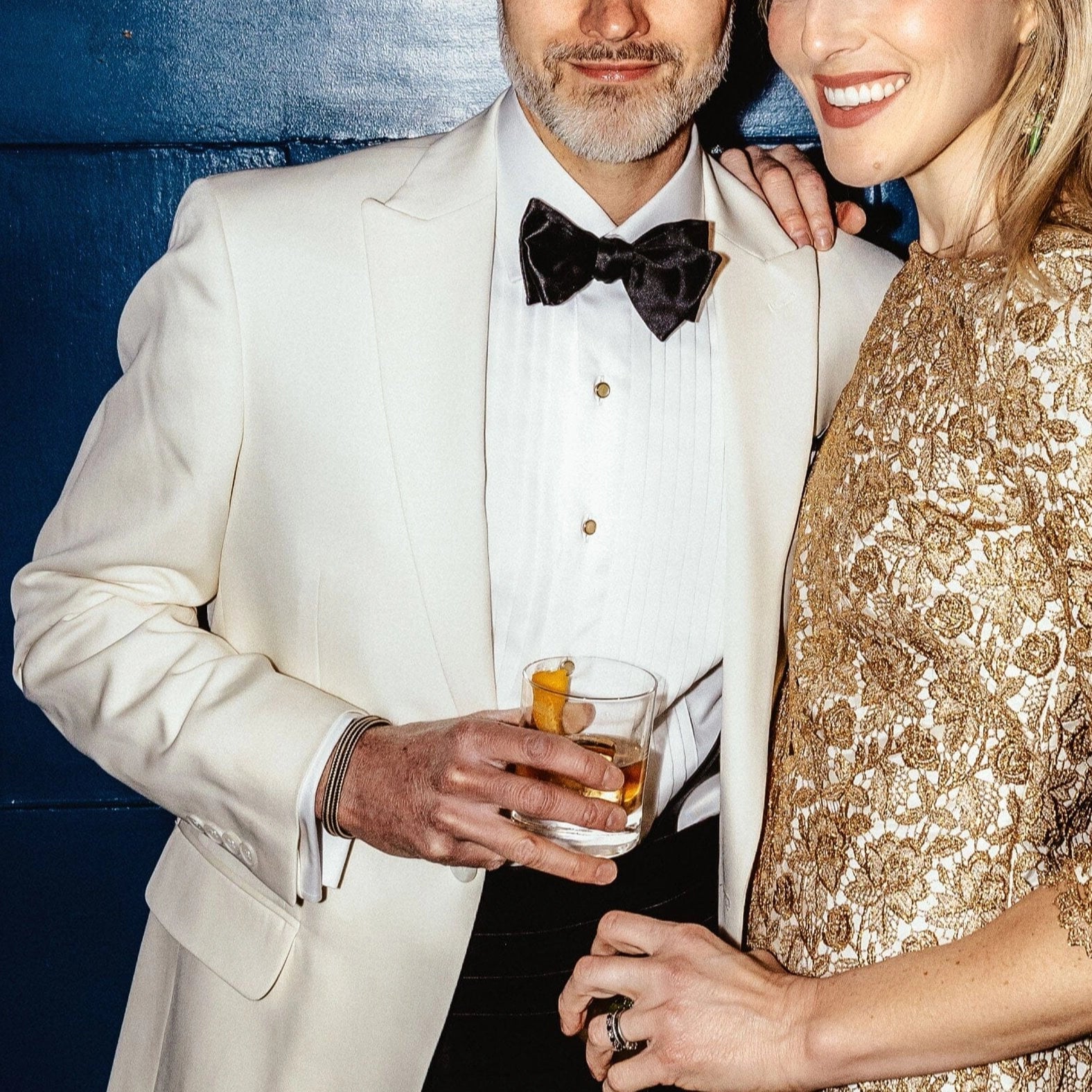 Man wearing white tuxedo shirt - pleated front non-iron formal dress shirt