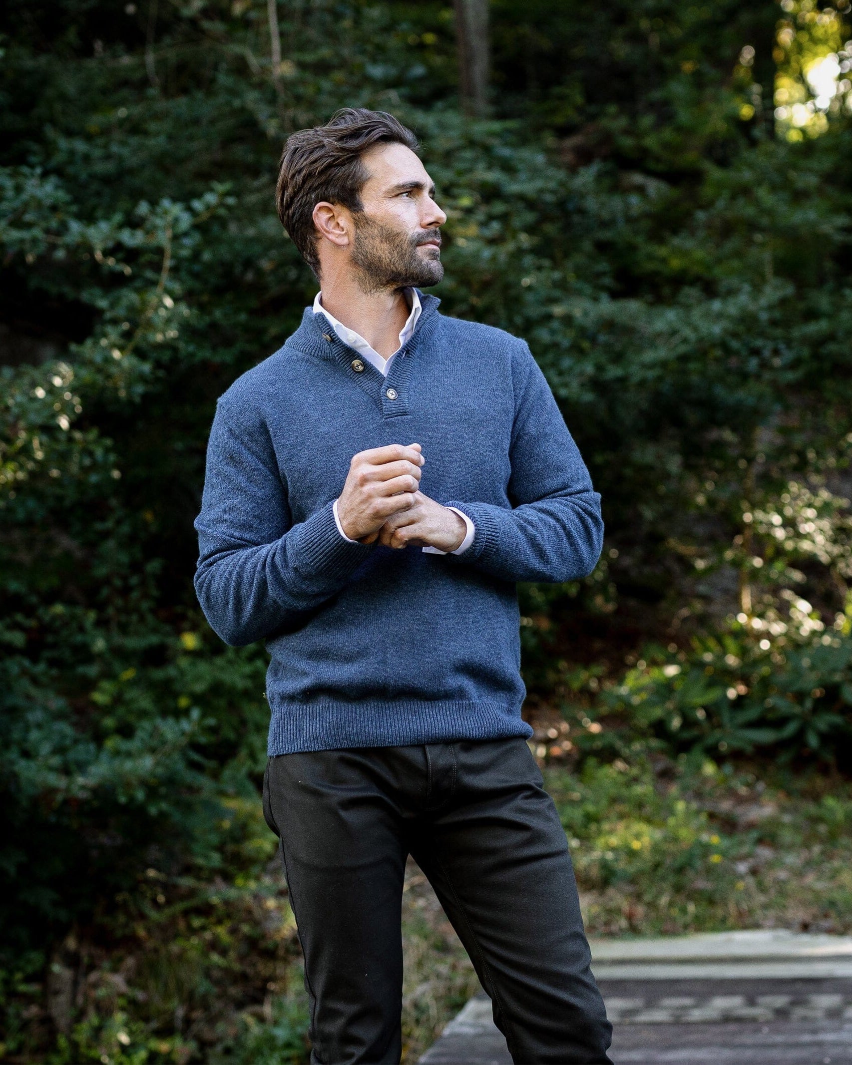 Blue Heather Brewer Mock Neck Sweater worn outdoors in lifestyle setting