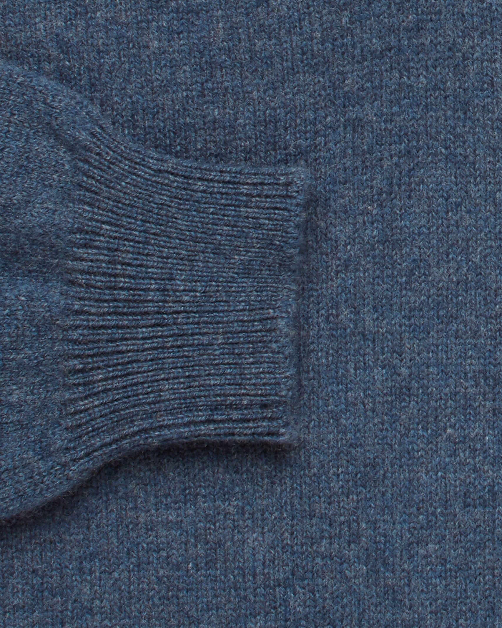 Sleeve and cuff detail on the Blue Heather Brewer Mock Neck Sweater