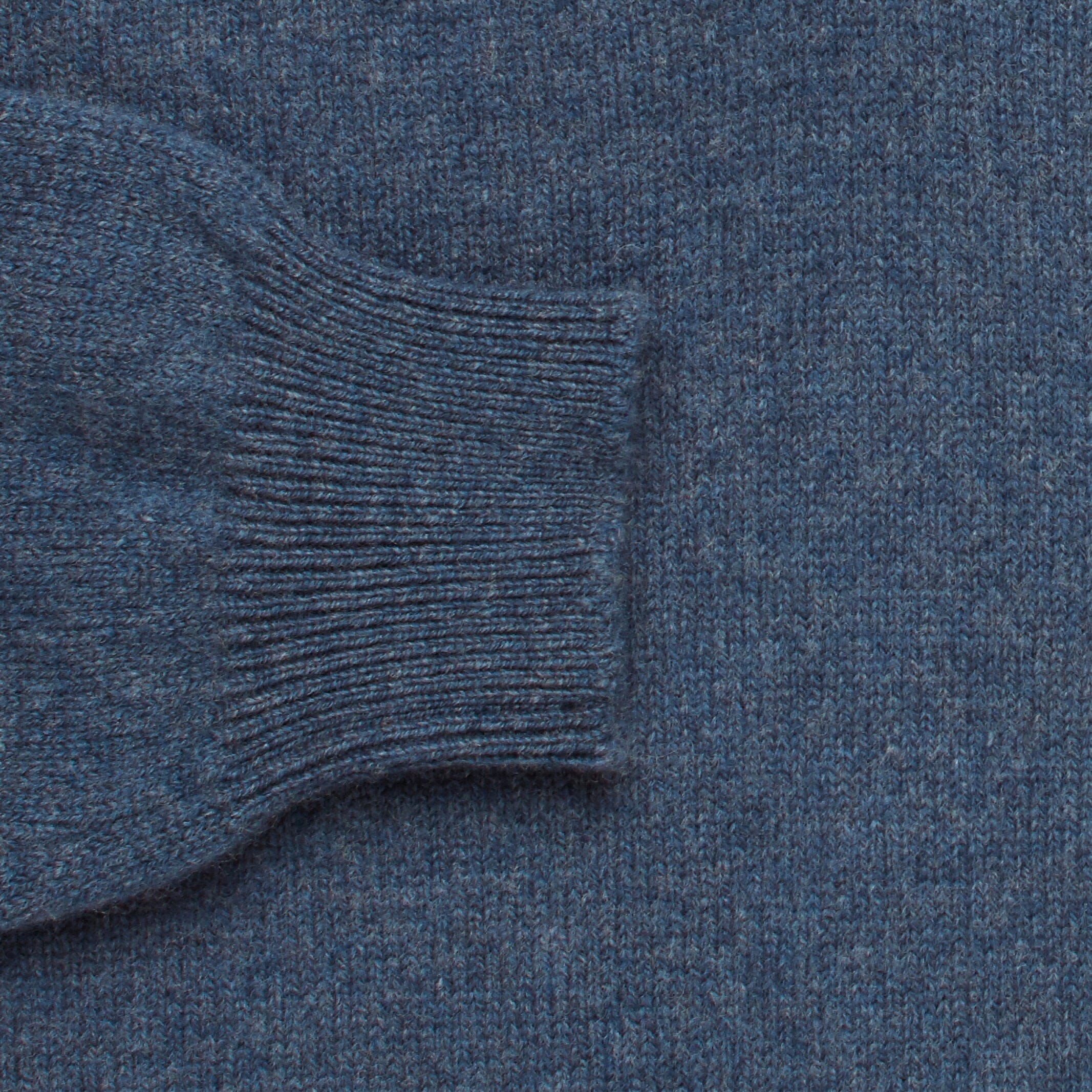 Sleeve and cuff detail on the Blue Heather Brewer Mock Neck Sweater