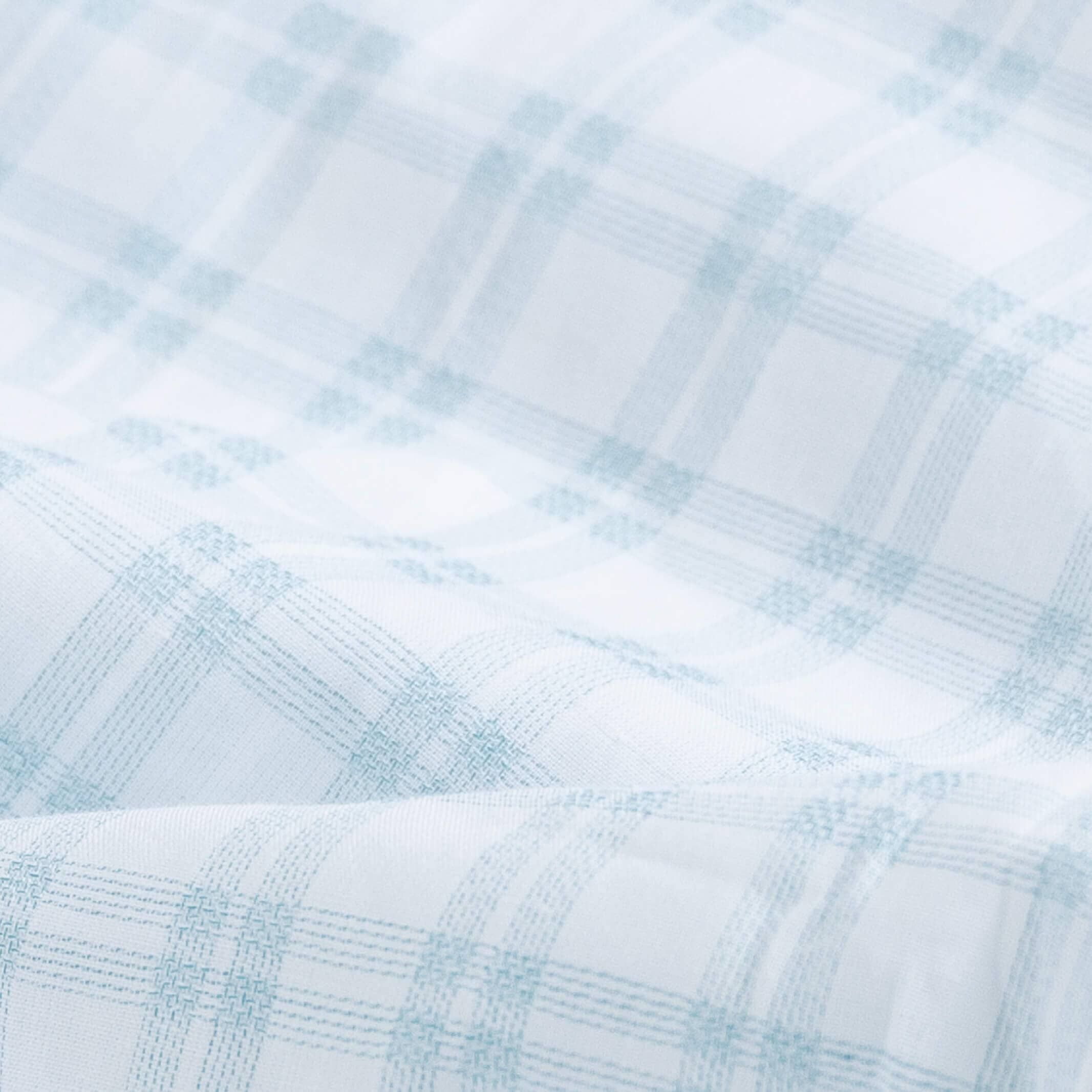 Green Ellis plaid fabric close-up - mixed open basket weave texture
