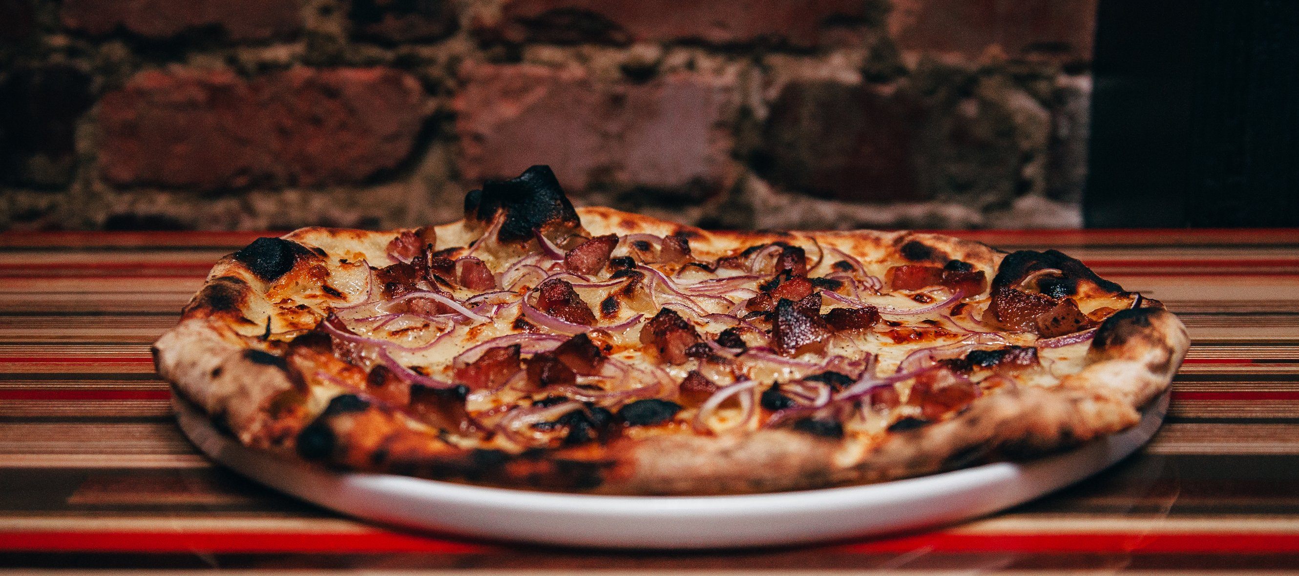 Tallegio, Onion, Guanciale Pizza from Pizza Tonight