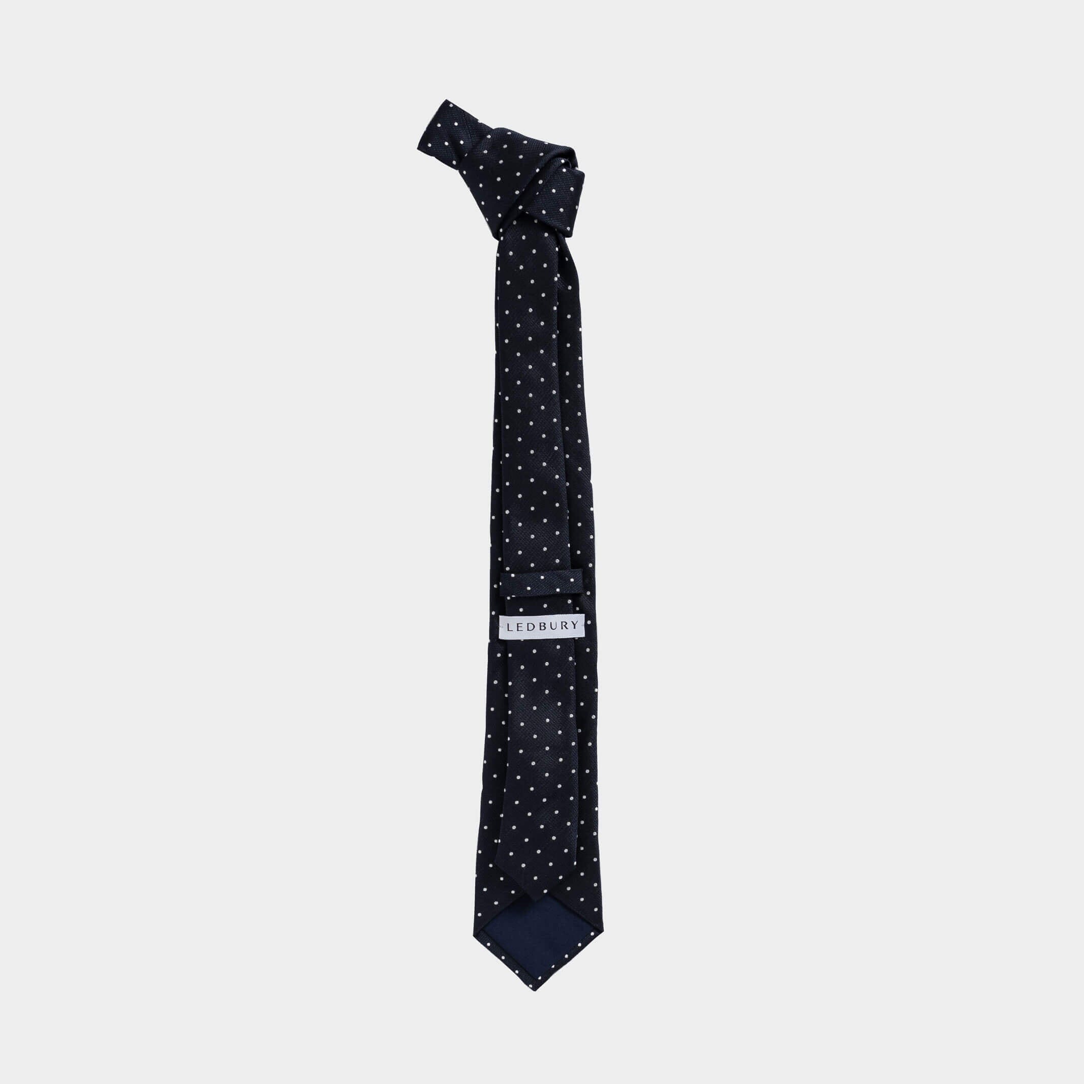 Full length back view of the Navy Sarto silk tie — modern width by Ledbury