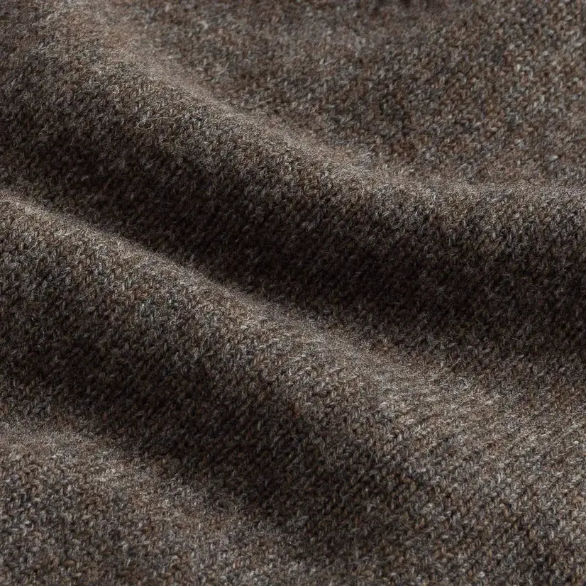 Close-up of seal heather superfine merino wool knit texture on the Brewer Mock Neck Sweater