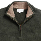 Vintage brass quarter-zip with leather pull detail on the Forest Ashton sweater by Ledbury