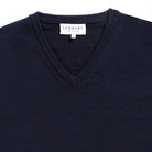 Rib-knit V-neck and cuff detail on the Navy Emmons sweater by Ledbury