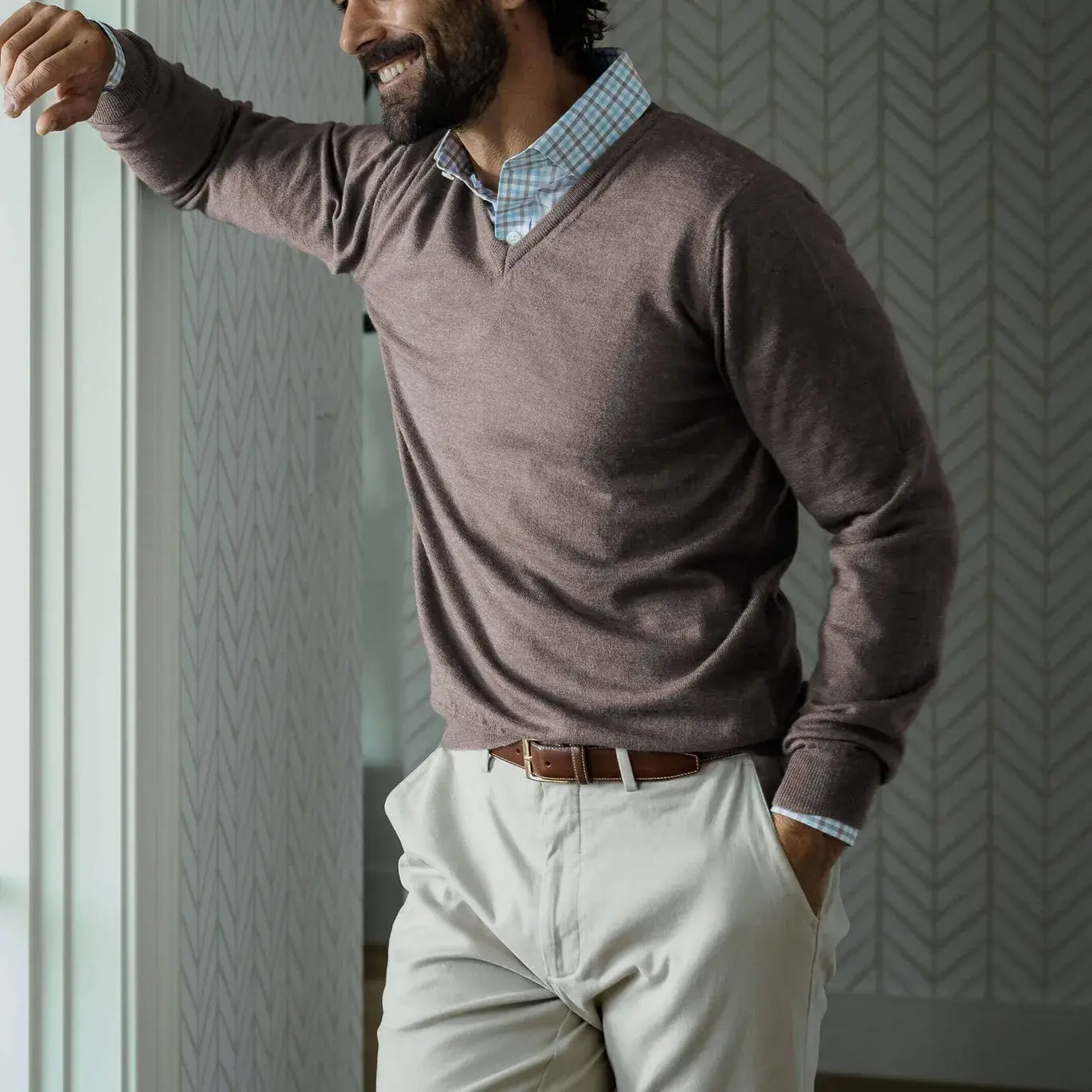 Men's Brown Heather Emmons V-neck sweater layered over a dress shirt — lifestyle shot