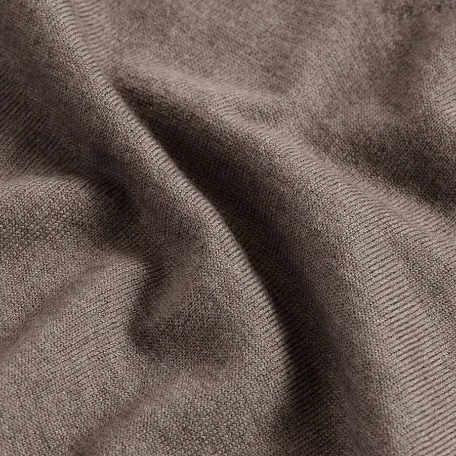Close-up of 100% extrafine wool fabric on the Brown Heather Emmons V-neck sweater