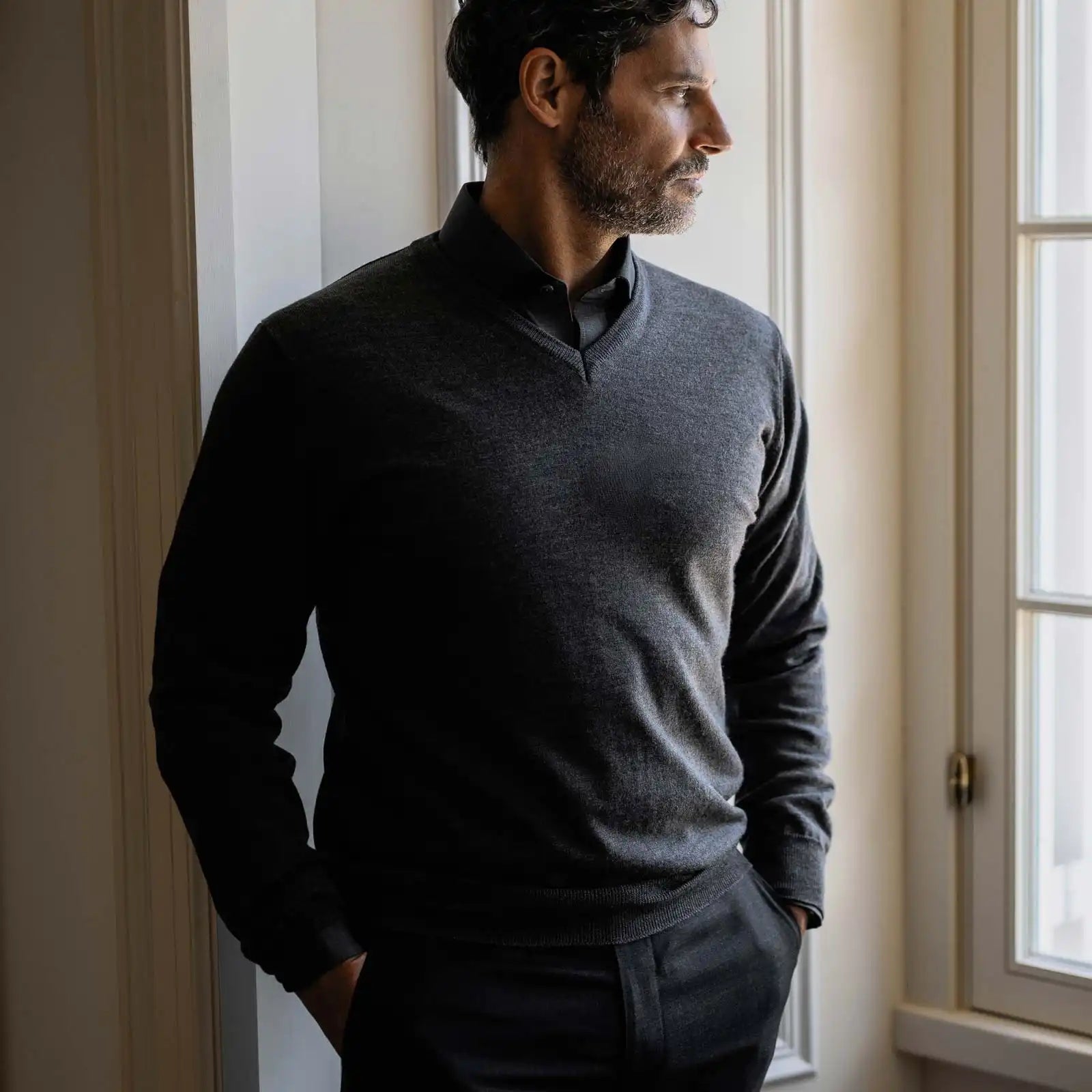 Men's Charcoal Heather Emmons V-neck sweater layered over a dress shirt — lifestyle shot