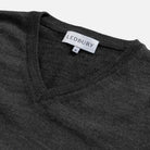 Rib-knit V-neck and cuff detail on the Charcoal Heather Emmons sweater by Ledbury
