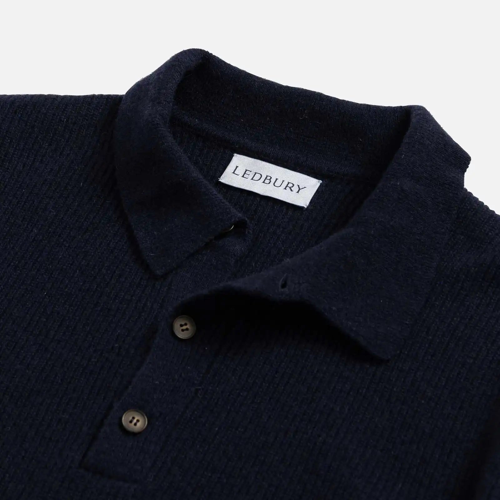Open knit collar detail on the Navy Atwood sweater by Ledbury