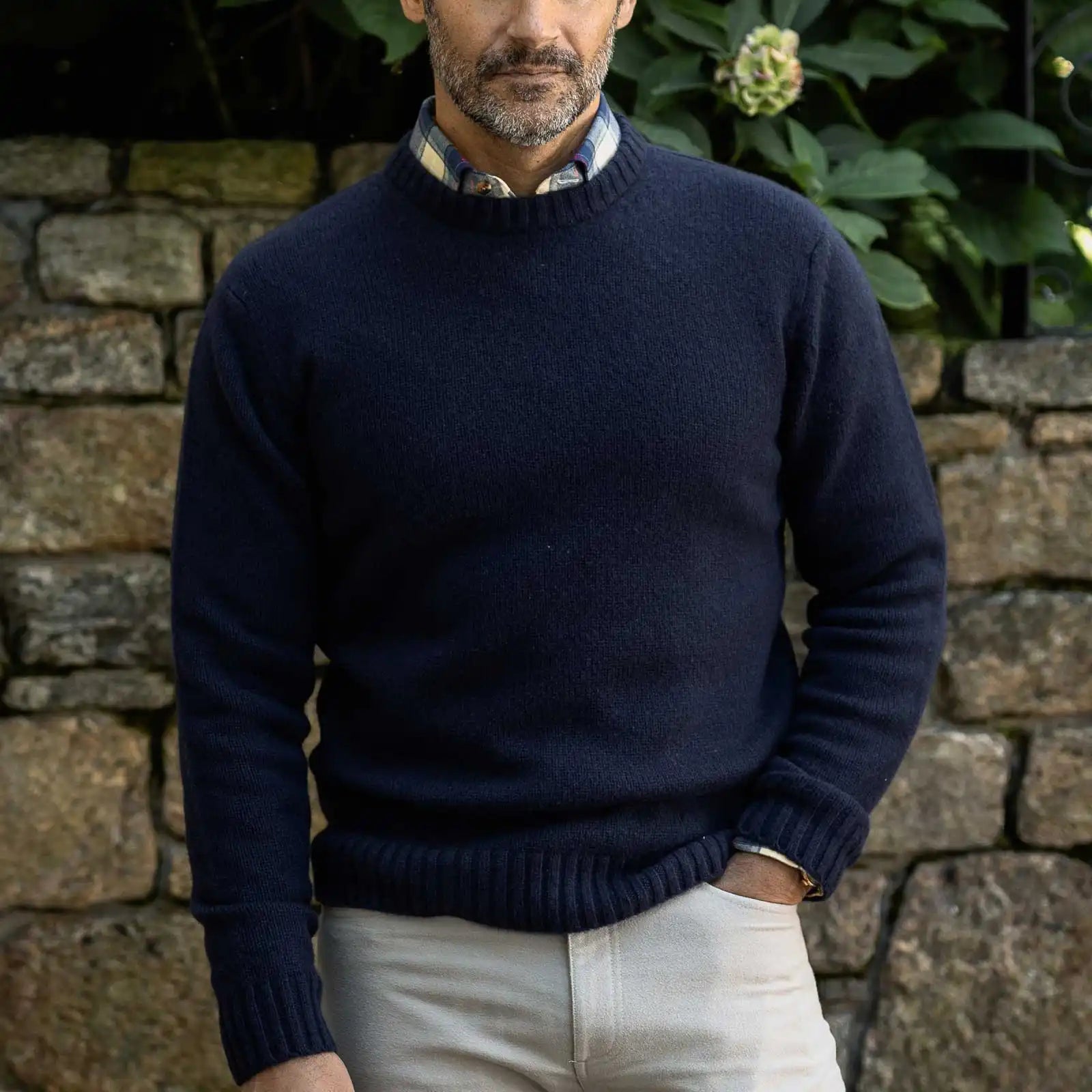 Men's Navy Boden Crew sweater styled with chinos — lifestyle shot