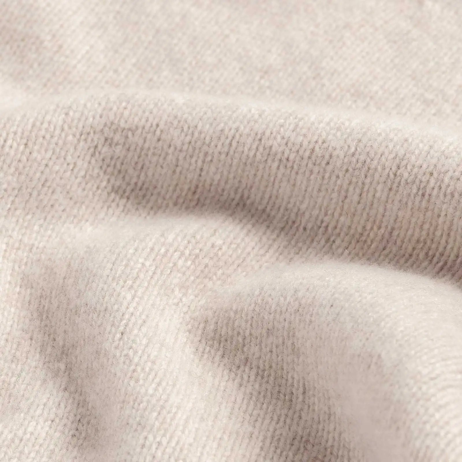 Close-up of 100% merino wool 5gg jersey knit on the Beige Boden Crew sweater