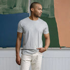 Model wearing Ledbury Heather Grey Crew Neck Undershirt, fitted sleeves and longer stay-tucked hem