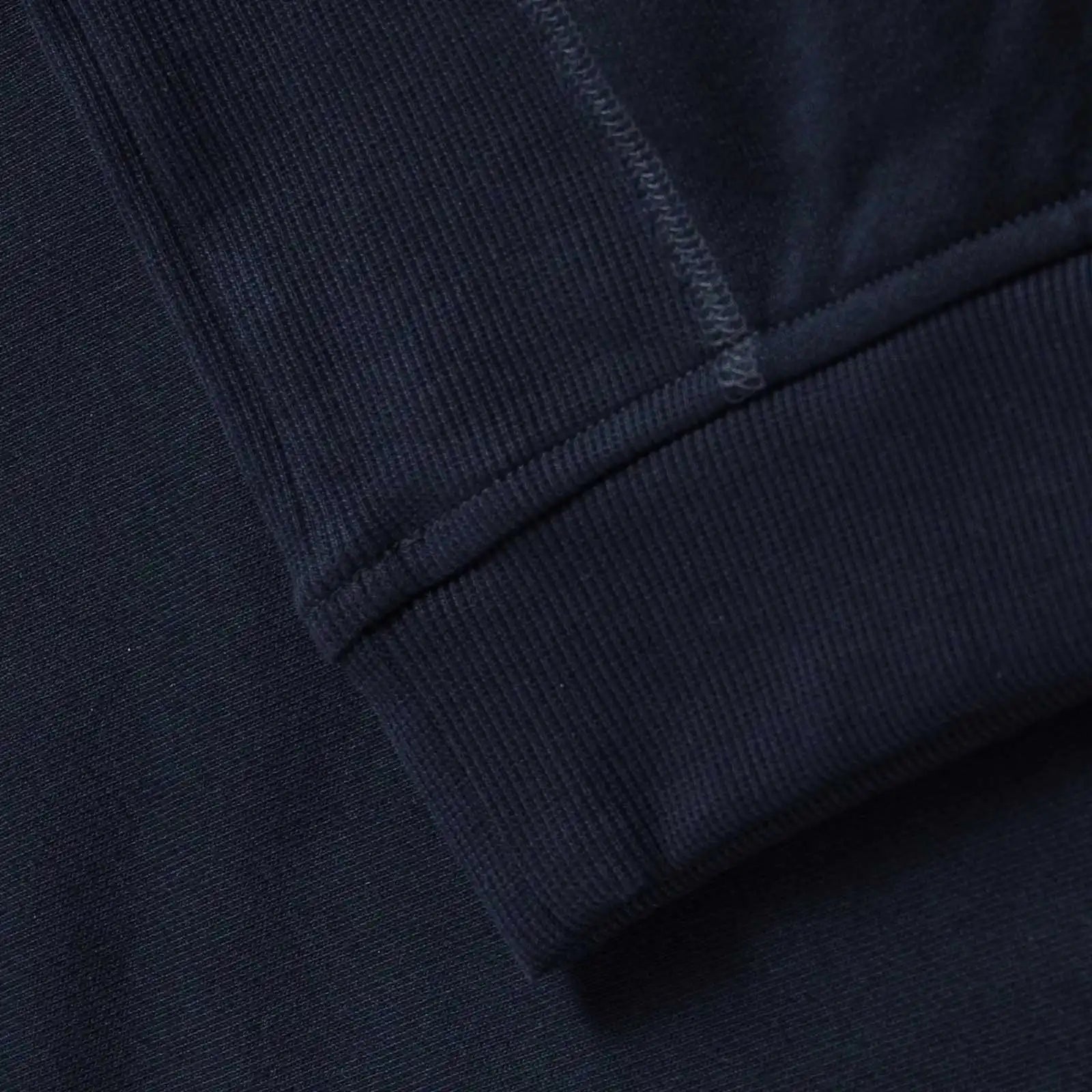 Ledbury Navy Quarter Zip – side view, contrast rib fabric side panel detail