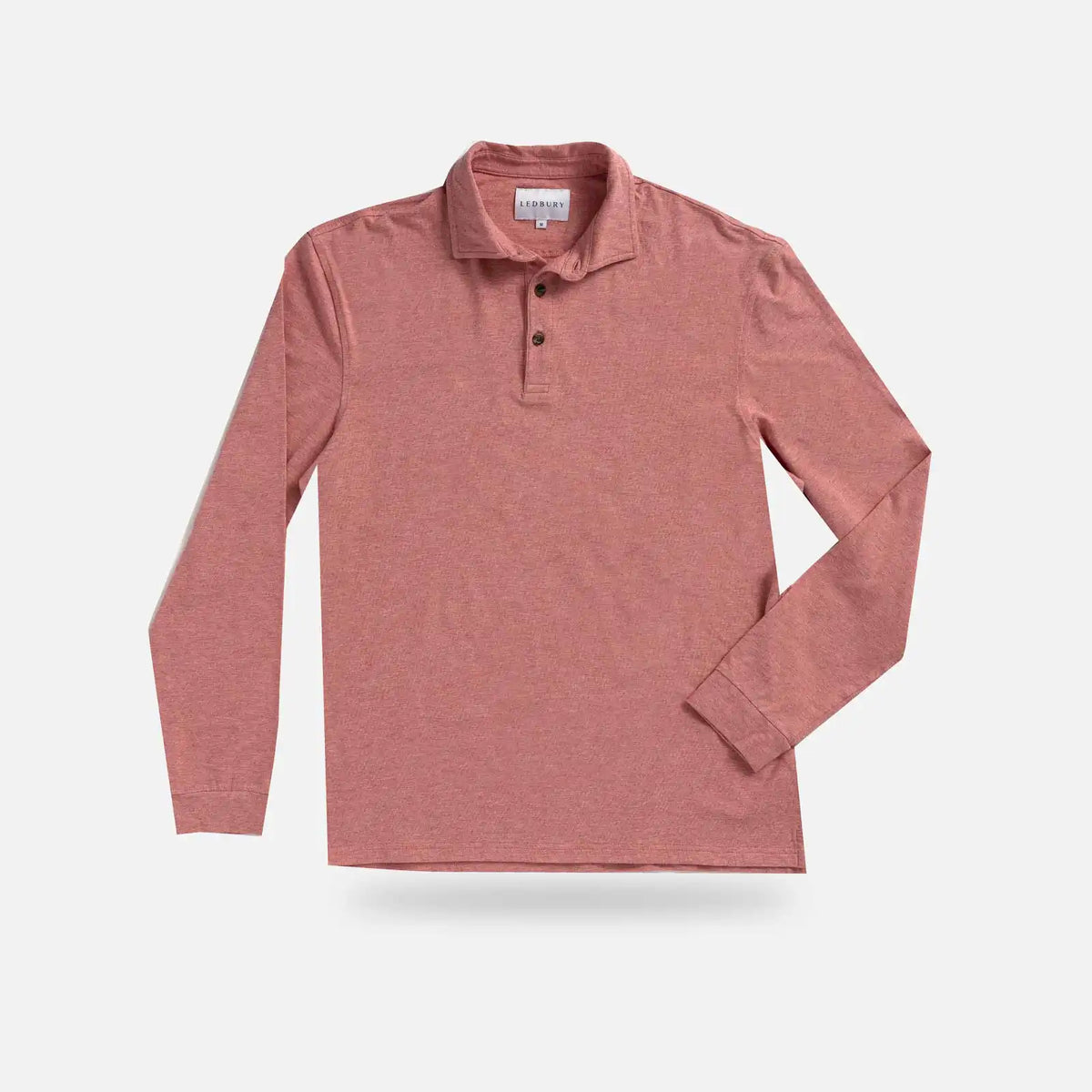 A long-sleeve polo shirt in a heathered red color, featuring a two-button placket and a classic collar, displayed flat against a light gray background.