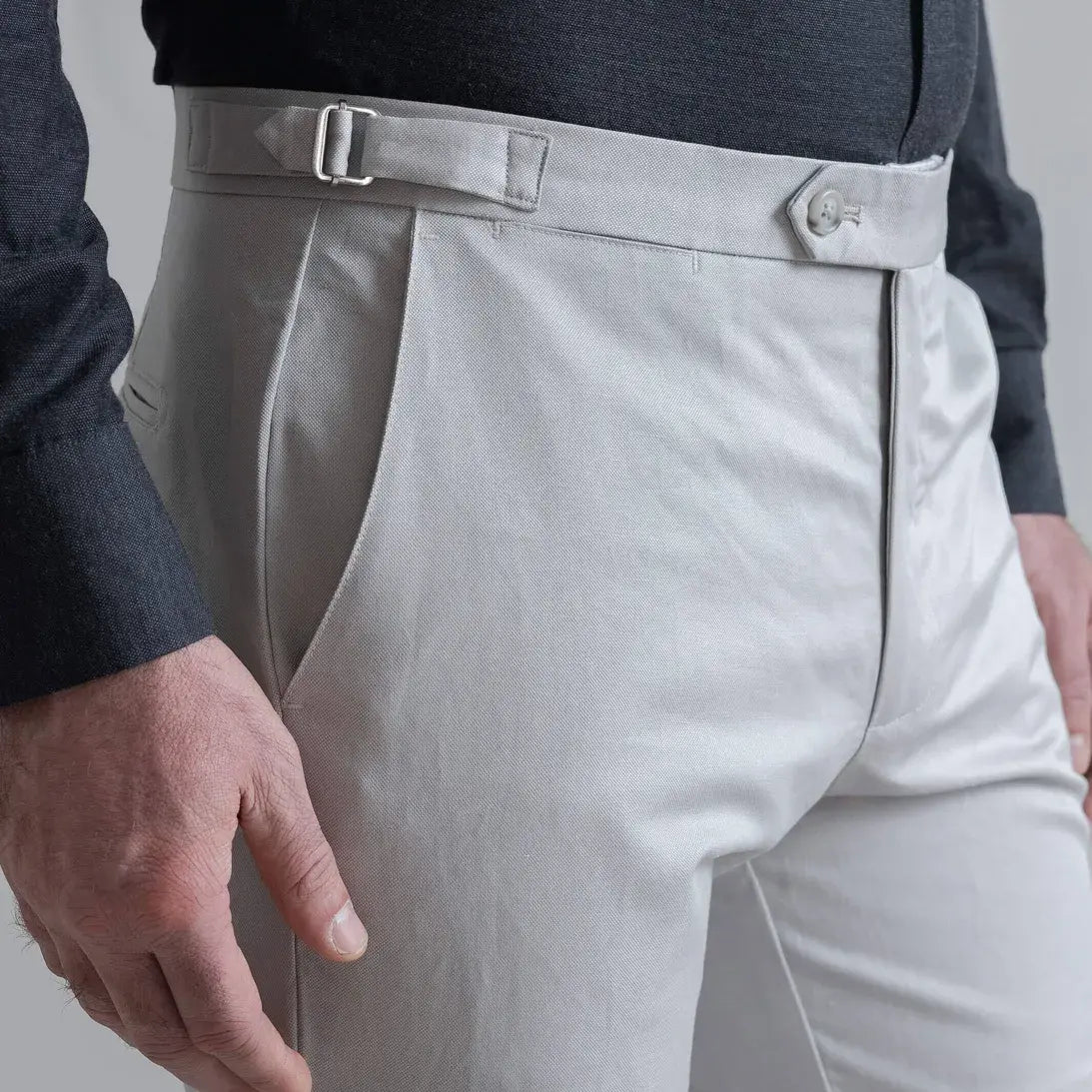 Ledbury Light Grey All Season Richmond Dress Chino with Side Tabs Custom Pant  on model — close-up of side tab detail for belt-free fit