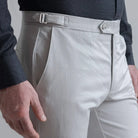 Ledbury Light Grey All Season Richmond Dress Chino with Side Tabs Custom Pant  on model — close-up of side tab detail for belt-free fit