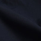 Ledbury Navy Performance Richmond Sport Chino Custom Pant — detail view of lightweight advanced polyester fabric
