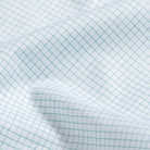 Leaf check fabric close-up - Ledbury Kentland twill with blue and green floating yarns