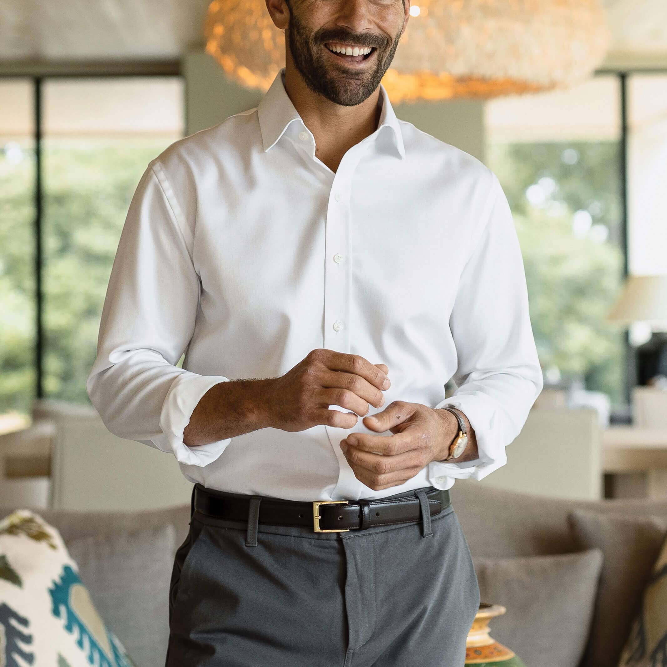 Man wearing white non-iron dress shirt - wrinkle-free custom fit business shirt