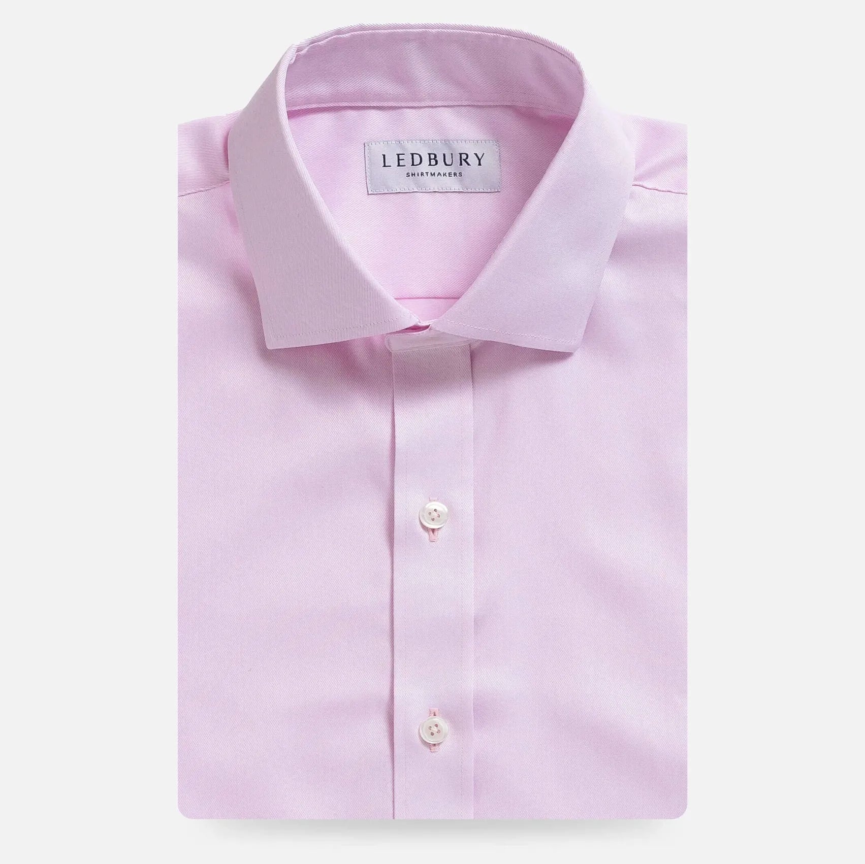 Pink non-iron dress shirt flat lay - wrinkle-free custom fit shirt