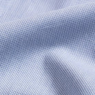 Textured dobby weave fabric close-up - light blue custom shirt