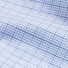 Kent micro-twill fabric close-up - blue windowpane check pattern texture